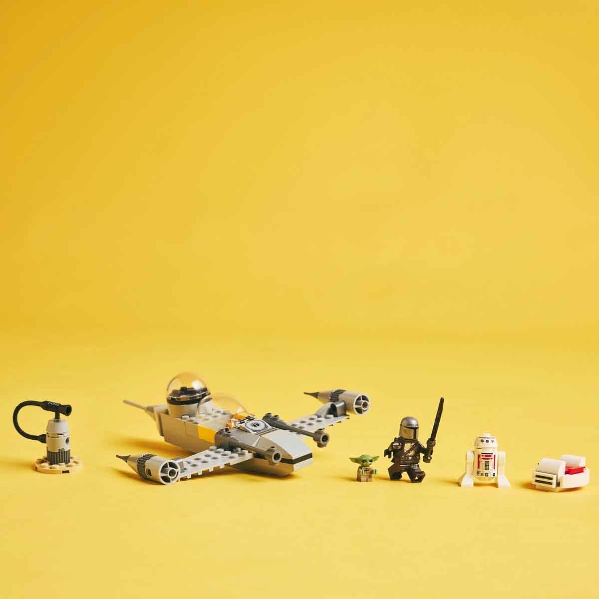 LEGO Star Wars 75410 Mandos and Grogu's N-1 Starfighter Toy featuring The Mandalorian, Grogu & R5-D4 Minifigures, including buildable fuel station, starship starter set for boys and girls aged 4 and up.