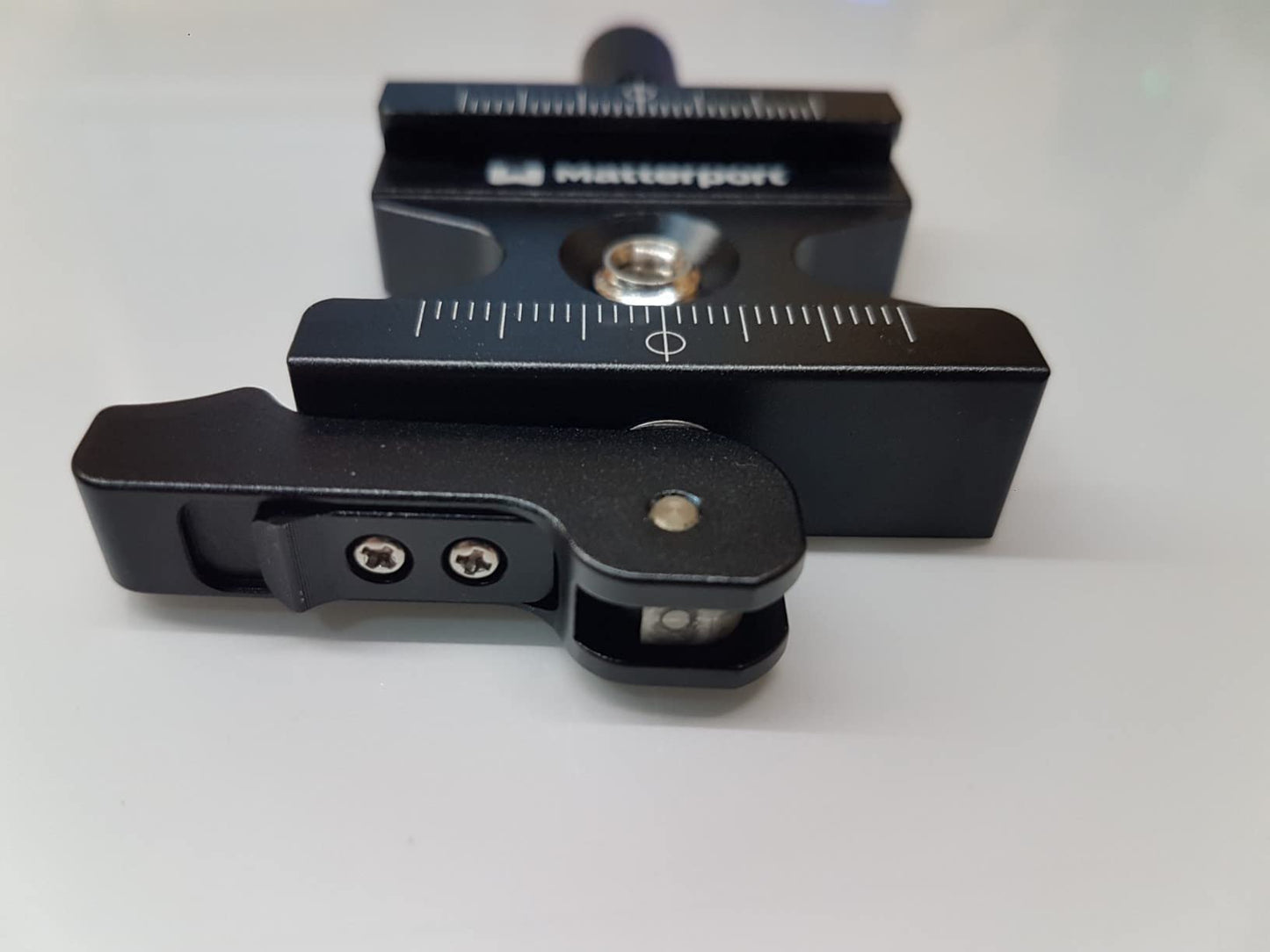 Matterport quick release camera clamp for tripods with adjustable lever knob.
