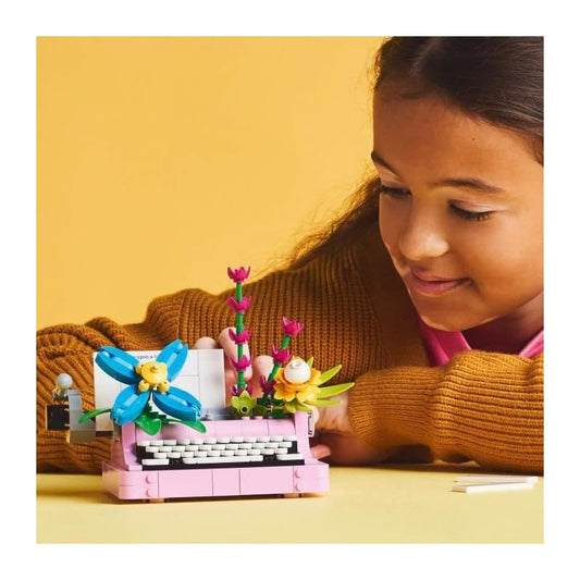 LEGO Creator 3in1 Typewriter with Flowers - can be rebuilt into a Keytar or a flowerpot with pen & notebook - Creative birthday gift for girls and boys aged 8 and up - 31169