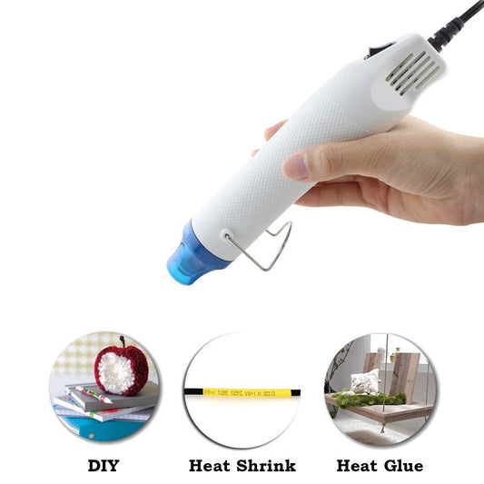 Mini 300W electric hot air gun shrink heat tool with embossing powder set. Perfect for drying paint, rubber stamp, and heating small clay works. Ideal for DIY projects.