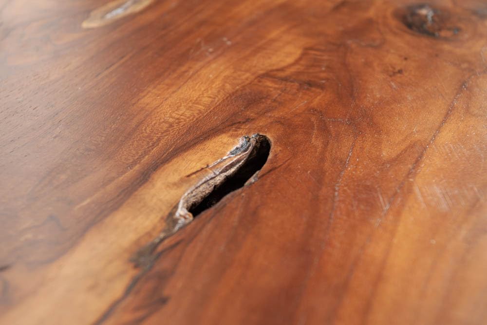 Invicta INTERIOR at riess-ambiente.de offers the tree trunk stool ROOT. Made of solid teak root wood, this versatile piece serves as a stool, side table or footrest in natural style.