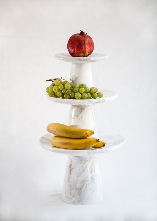 White marble design etagere as a serving platter or cake plate for the festive table.
