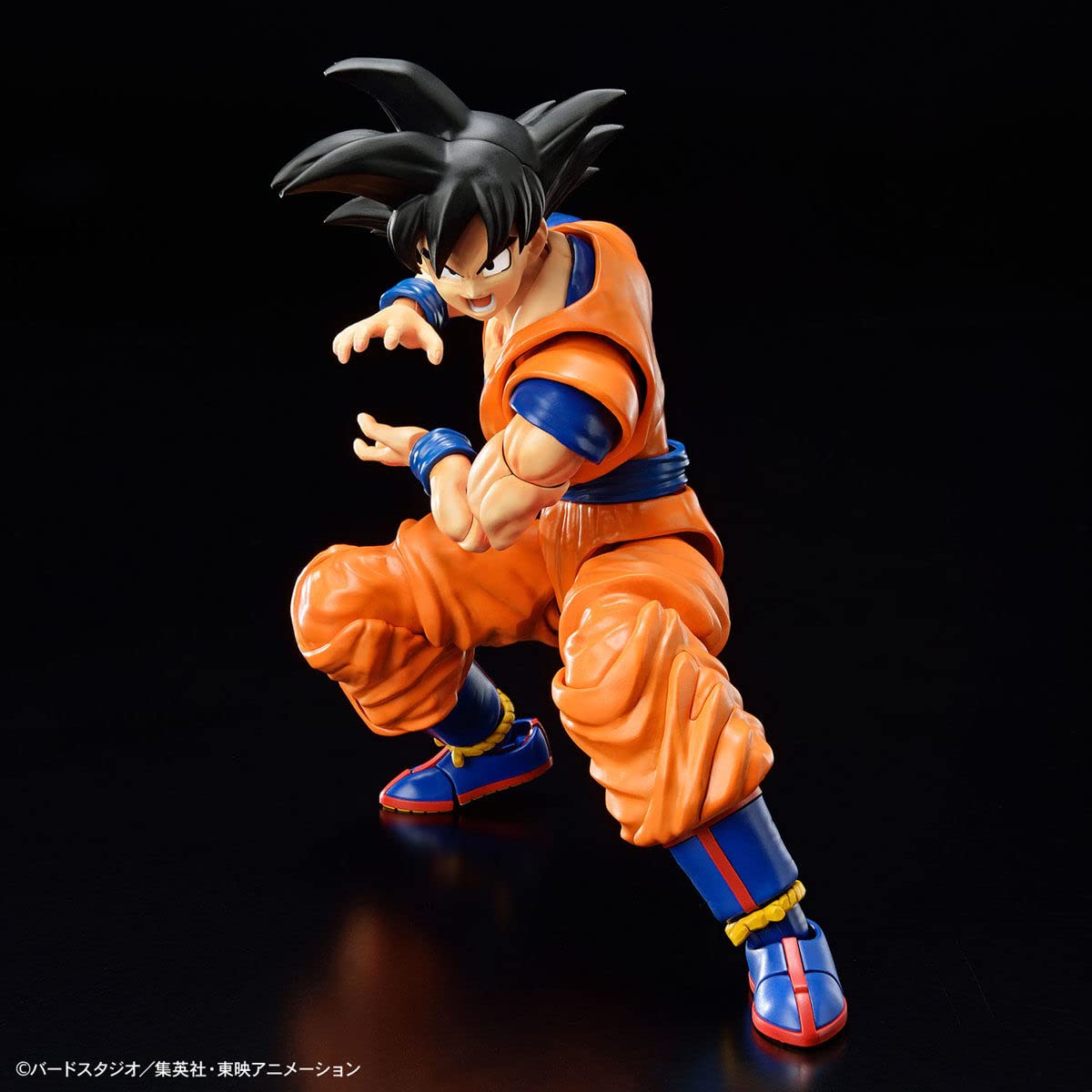 Dragon Ball - Figure Rise Standard Son Goku (New Spec Ver.) - Model kit, Orange/Sunset Chevron pattern.