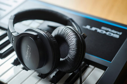 Roland RH-5, closed-back over-ear monitoring headphones, premium performance for daily producing and music listening, balanced sound, lightweight and comfortable, includes adapter plug.