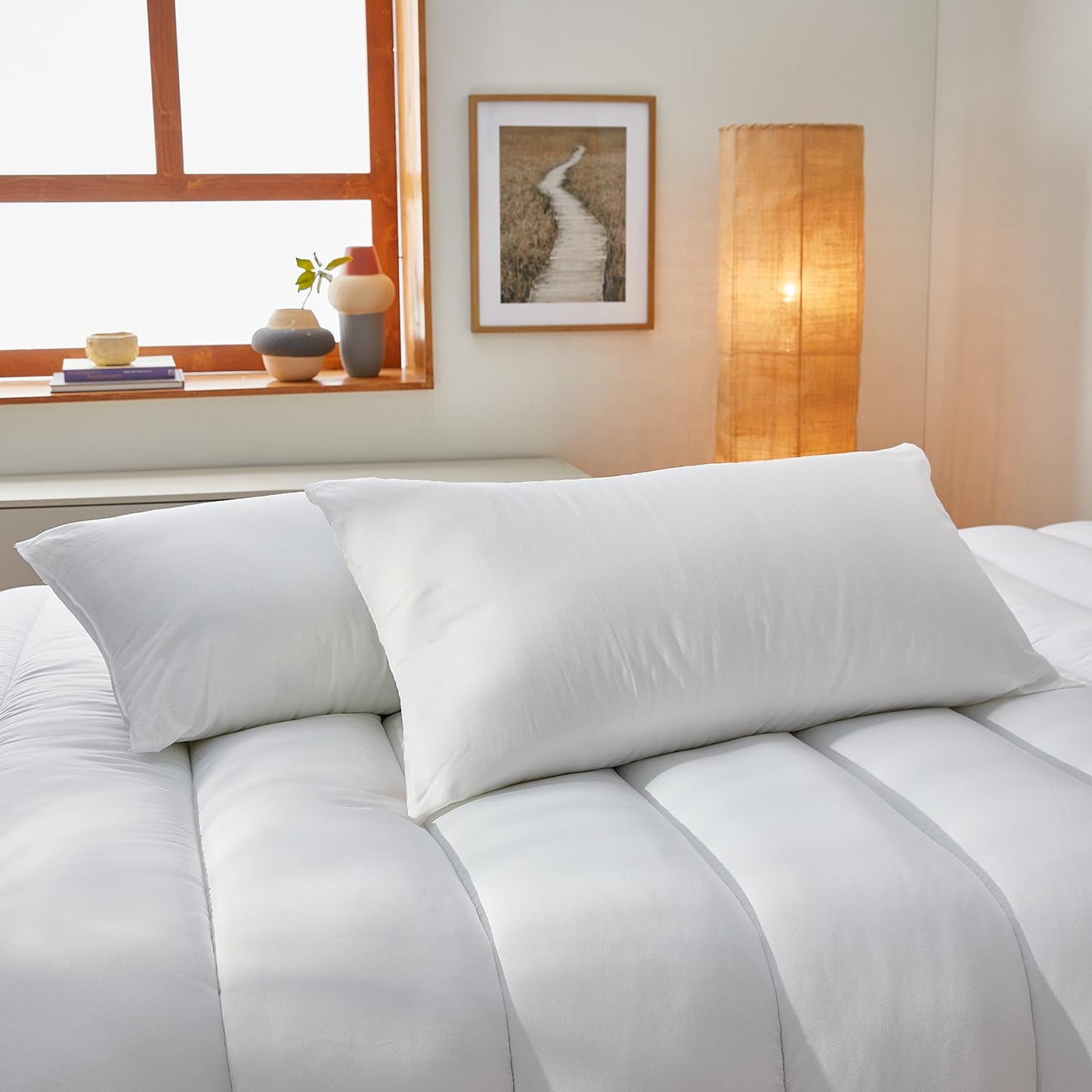 Pikolin Home anti-dust mite fiber pillow, preventing allergy symptoms, suitable for side or back sleeping with medium firmness.