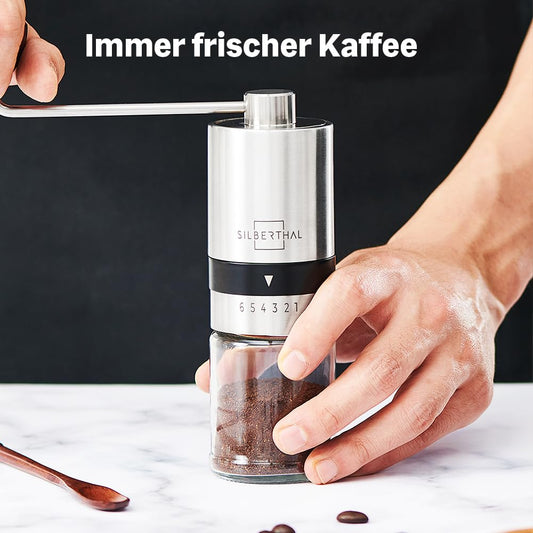 SILBERTHAL Manual Coffee Grinder with Stainless Steel Conical Burr - Stepless precise grind settings - Stainless steel and glass hand mill - Ideal for on the go, camping, vacation.