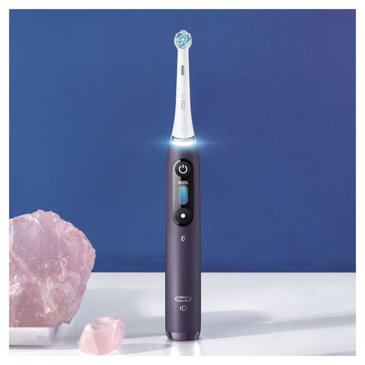 Oral-B iO Series 8 Electric Toothbrush, 2 brush heads, 6 cleaning modes, color display & travel case, gift for men/women, Designed by Braun, violet ametrine.