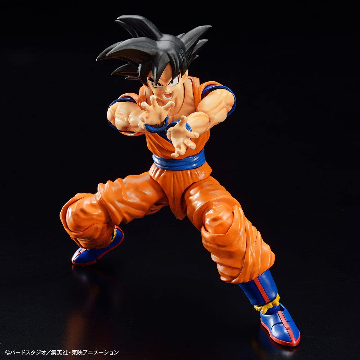 Dragon Ball - Figure Rise Standard Son Goku (New Spec Ver.) - Model kit, Orange/Sunset Chevron pattern.