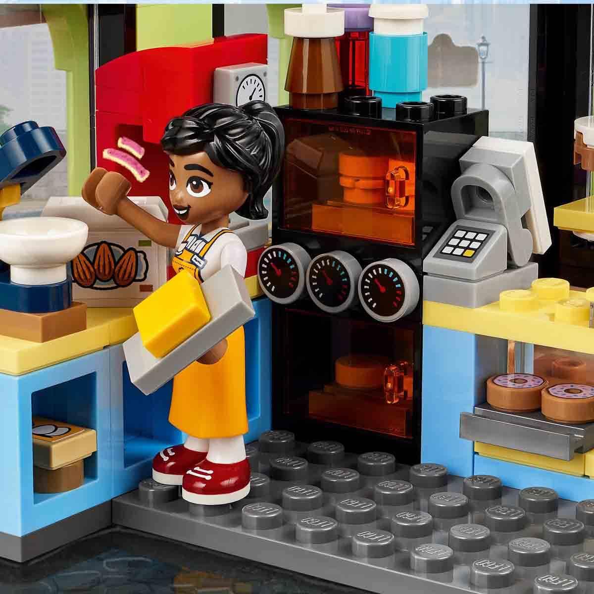 LEGO Friends Heartlake City Café, kids' toy, bakery playset, gift idea for girls and boys ages 6+, includes 3 minifigures and a dog figure 42618