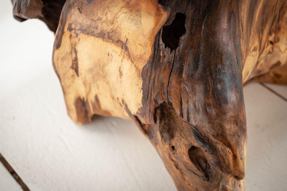 Invicta INTERIOR at riess-ambiente.de offers the tree trunk stool ROOT. Made of solid teak root wood, this versatile piece serves as a stool, side table or footrest in natural style.