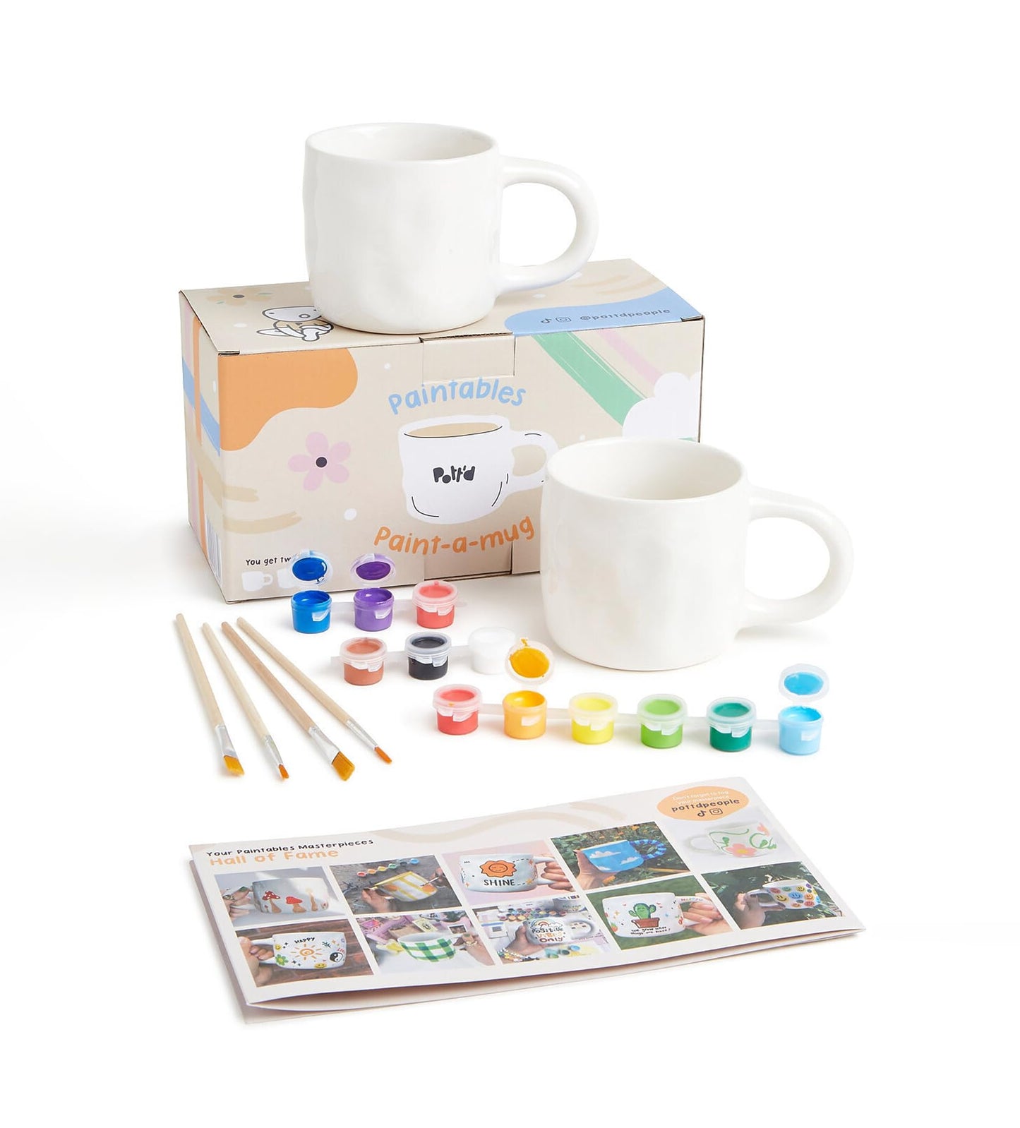 Pott'd Paintables cups for adults, ceramic painting set with cups, paints, brushes, and painting inspirations for painting the cups yourself.