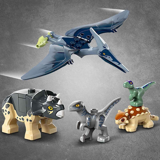 LEGO Jurassic World Baby Dino Rescue Center set features small dinosaur figures including Triceratops, Ankylosaurus, and Velociraptor. Perfect gift for boys and girls aged 4+ to build. Item number 76963.