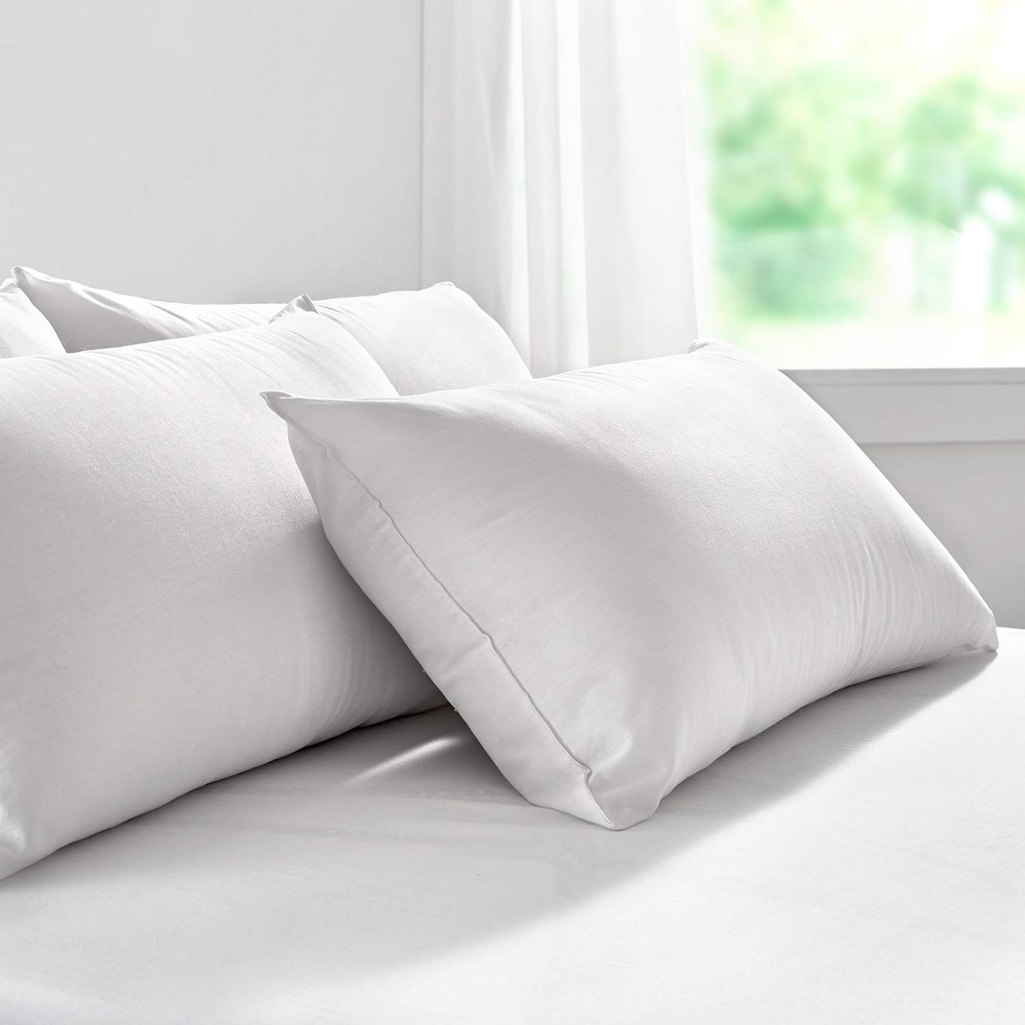 Pikolin Home anti-dust mite fiber pillow, preventing allergy symptoms, suitable for side or back sleeping with medium firmness.
