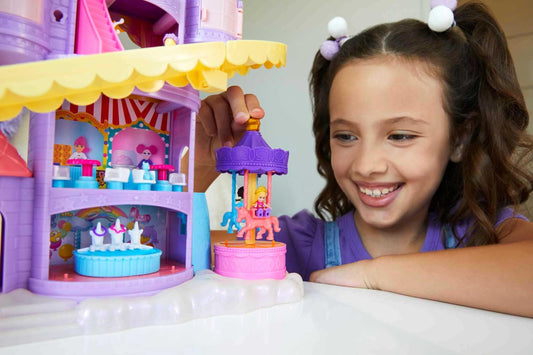 Polly Pocket HBT13 - Rainbow Unicorn Fun Fair, 3 different amusement park attractions, 7 play areas, 2 dolls, 2 unicorns, and 25 surprises (30 total pieces), for ages 4 and up.