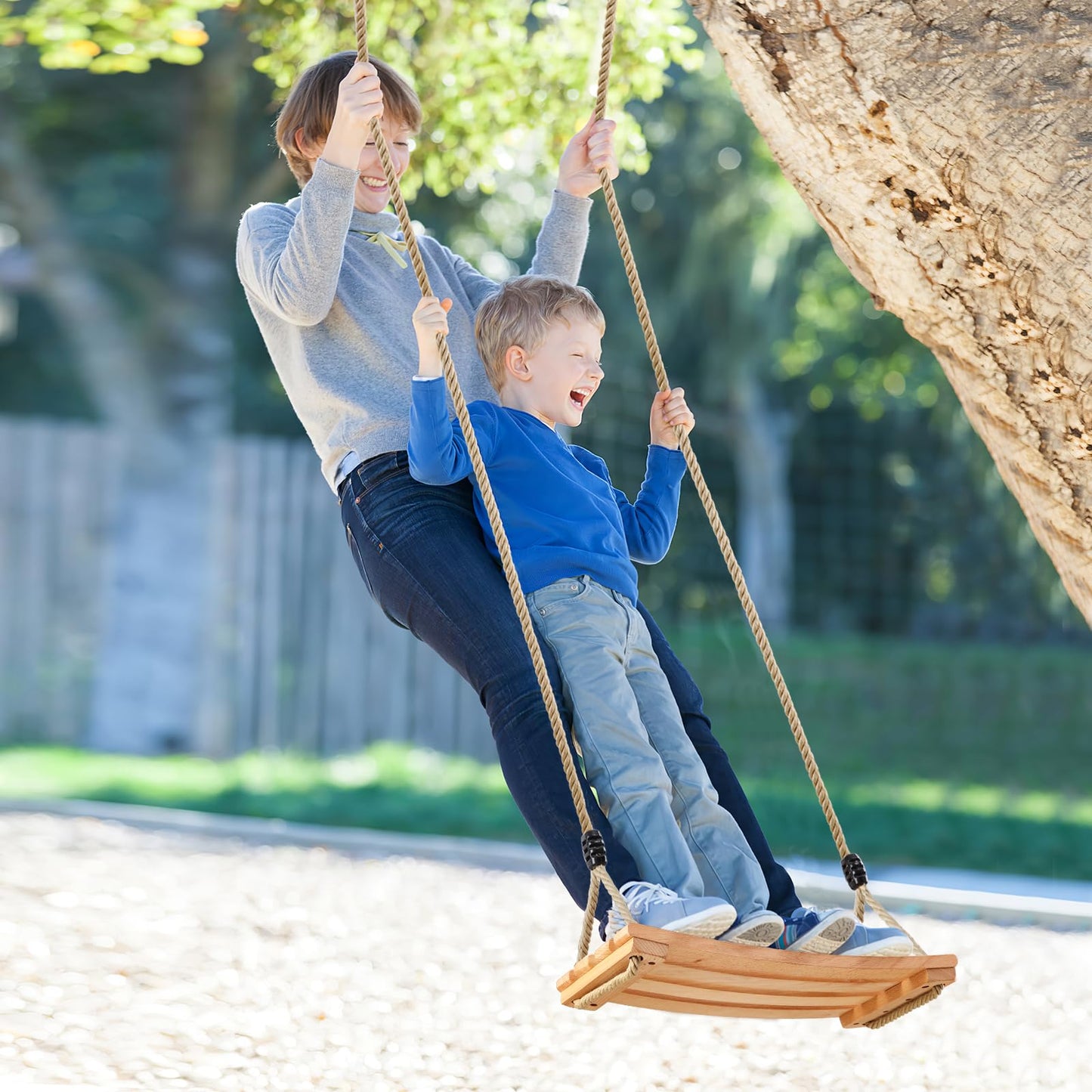 An exercise wooden swing seat for adults and children, with adjustable rope up to 100kg, suitable for indoor and outdoor use.
