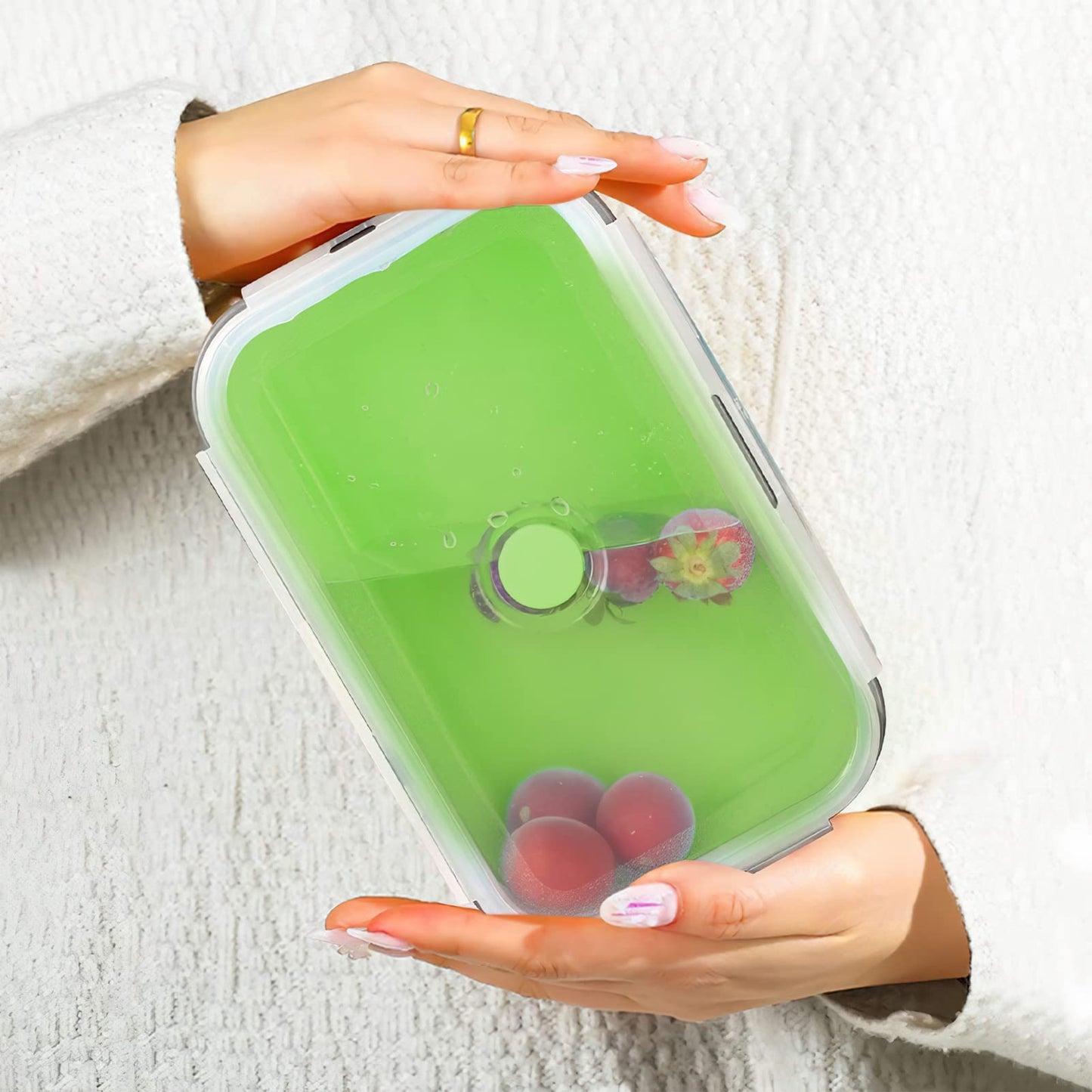 Collapsible silicone storage container with lid, portable bento box for space-saving, microwave-safe, 4-piece set, green.