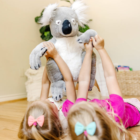Melissa & Doug 18806 Koala - Lifelike plush toy with realistic facial expression.