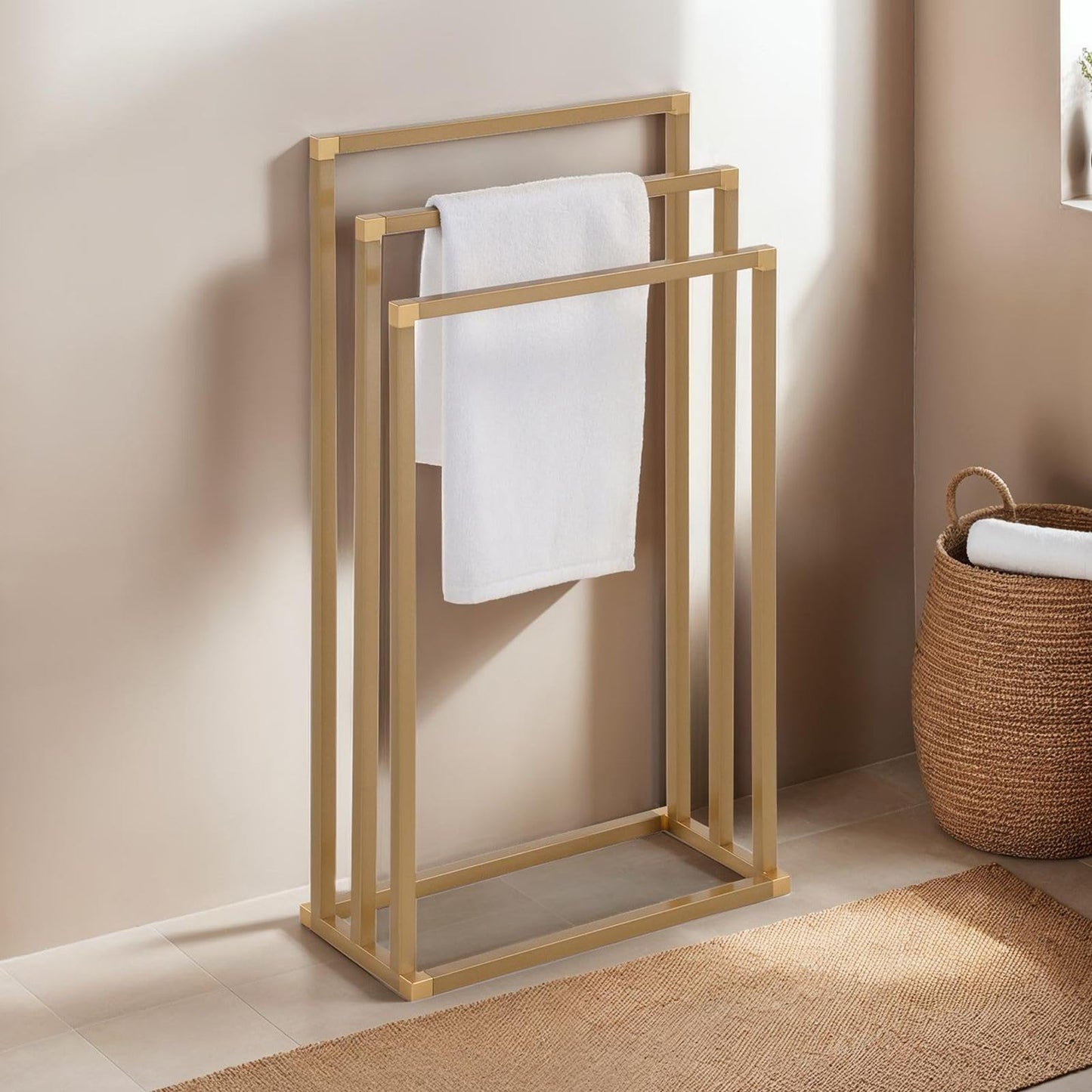 Towel holder KUNO, gold painted - freestanding towel rack with 3 bars, made of metal.