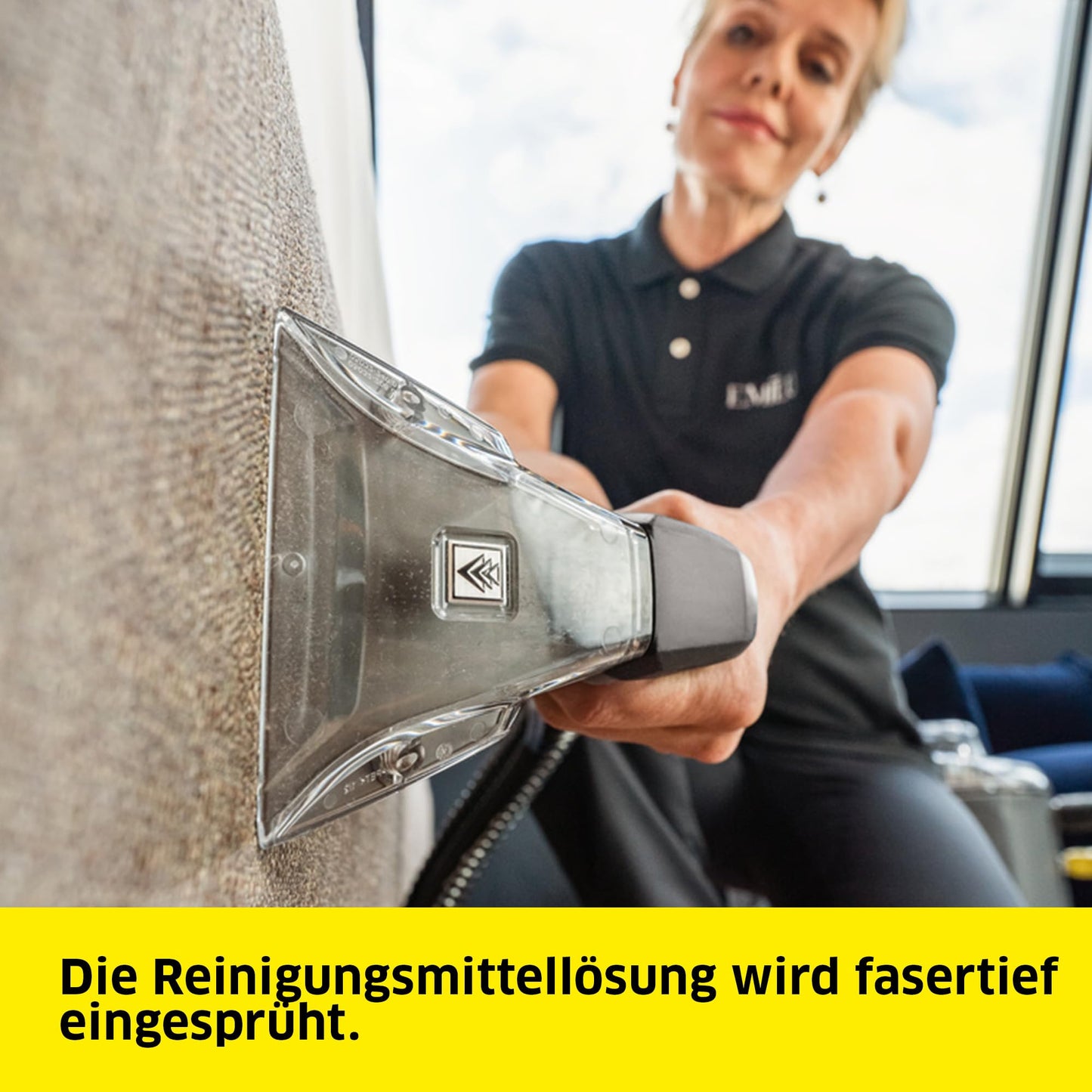 Kärcher carpet cleaner Puzzi 8/1, powerful for upholstery cleaning and spot removal on textiles, includes ergonomic short upholstery nozzle.
