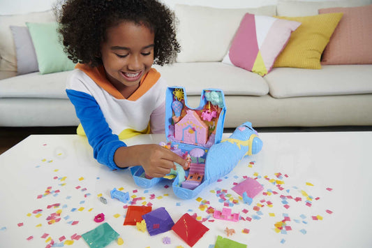 Polly Pocket case, llama in pajama party theme, with 25 accessories including 2 dolls and 2 llamas, interactive elements for immersive play, toy for ages 4 and up, HHX74.