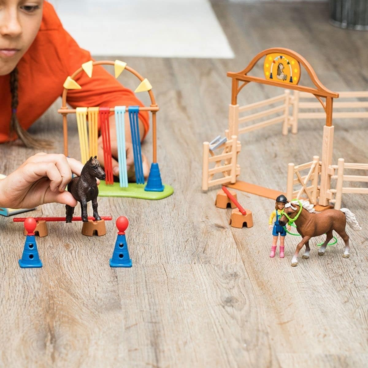 Farm World Pony Agility Starter Set 42481 includes 2 ponies, girl, course & accessories. Combine & kid-friendly designed. Farm toy for kids 3+ years. 41 pieces.