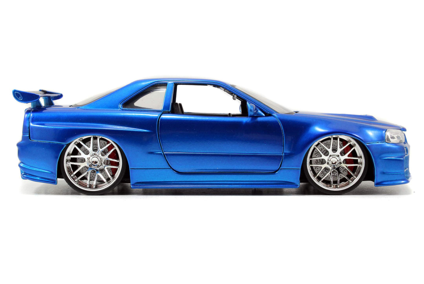 Jada Toys Fast & Furious Brian's 2002 Nissan Skyline GTR-R R34, car, die-cast toy car, opening doors, trunk & hood, 1:24 scale, blue.