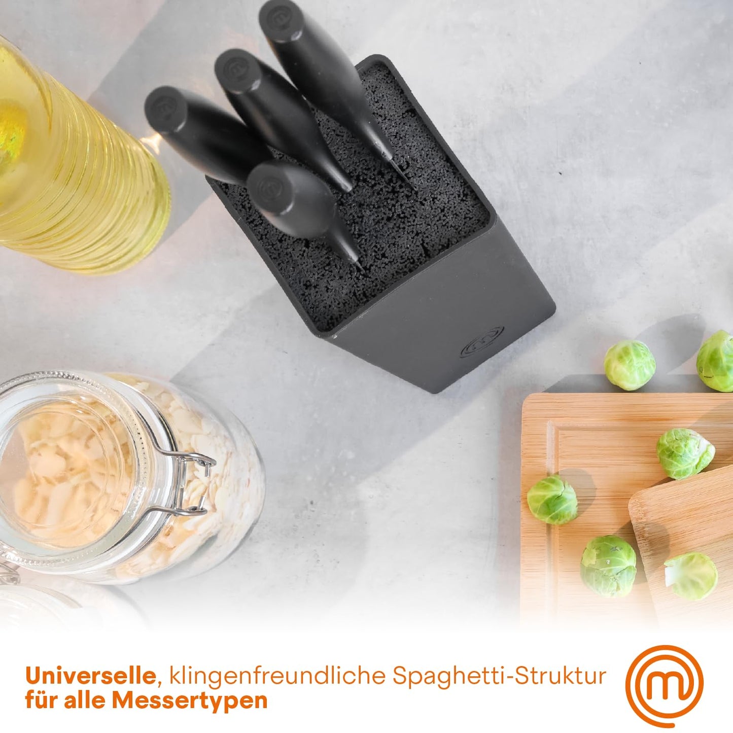 MasterChef knife block with cake knife set including Santoku knife, bread knife, chef's knife, vegetable knife, and utility knife. Made of stainless steel, sharp, 5 pieces, black, with soft-touch handles.