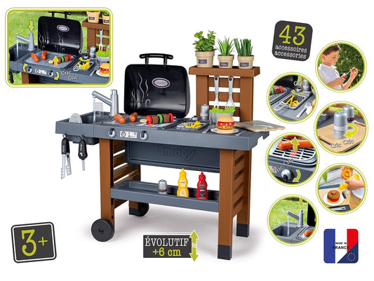 Smoby - Outdoor garden play kitchen - includes grill, sink with water pump function, and many accessories, for children ages 3 and up.