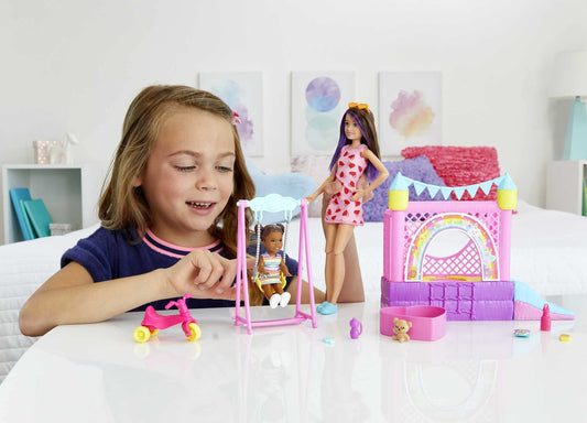 Barbie Skipper Babysitter Inc Bounce House, includes 1 Skipper doll with brown and purple hair, 1 toddler with brown braids, swing, slide, accessories, gift for kids ages 3 and up.