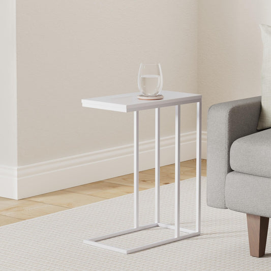 Side table Debora, practical living room table in C-shape, lovely coffee table with rectangular white tabletop, elegant sofa table with white metal frame.