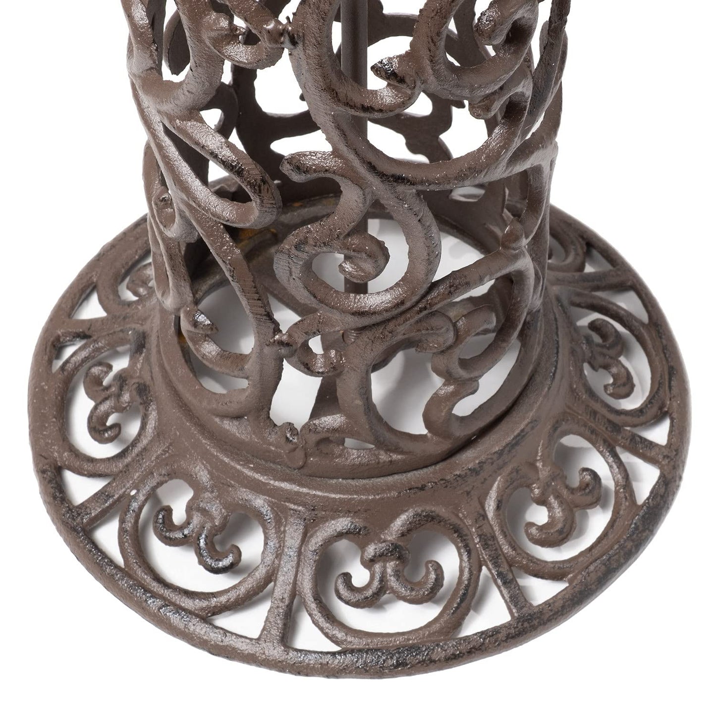 Large bird bath with decorative birds made of cast iron. Metal water bowl for feeding and garden decoration.