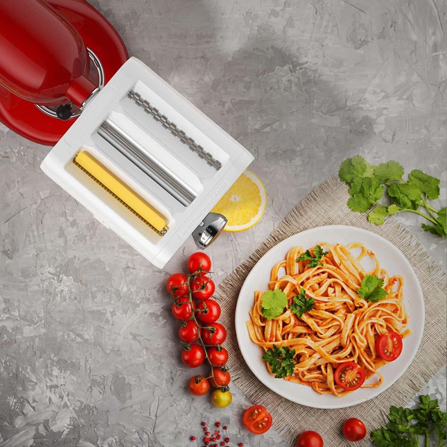 Pasta attachment for KitchenAid stand mixers. 3-in-1 set includes pasta roller, spaghetti cutter, and fettuccine cutter. Perfect accessory for making homemade pasta.