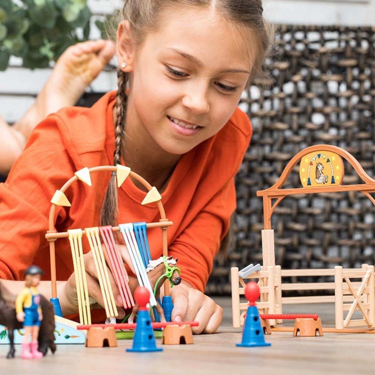 Farm World Pony Agility Starter Set 42481 includes 2 ponies, girl, course & accessories. Combine & kid-friendly designed. Farm toy for kids 3+ years. 41 pieces.
