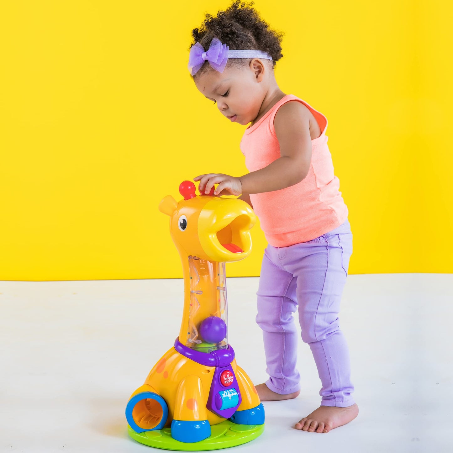 Bright Starts Spin & Giggle Giraffe Ball and Popper musical activity toy, age 12 months +