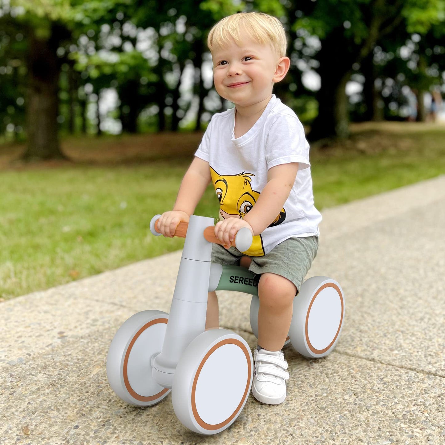 SEREED Kids Balance Bike from 1 year, walking bike toy for 12-24 months baby, first bike without pedals with 4 wheels for boys and girls, toddlers first birthday gift, Green.