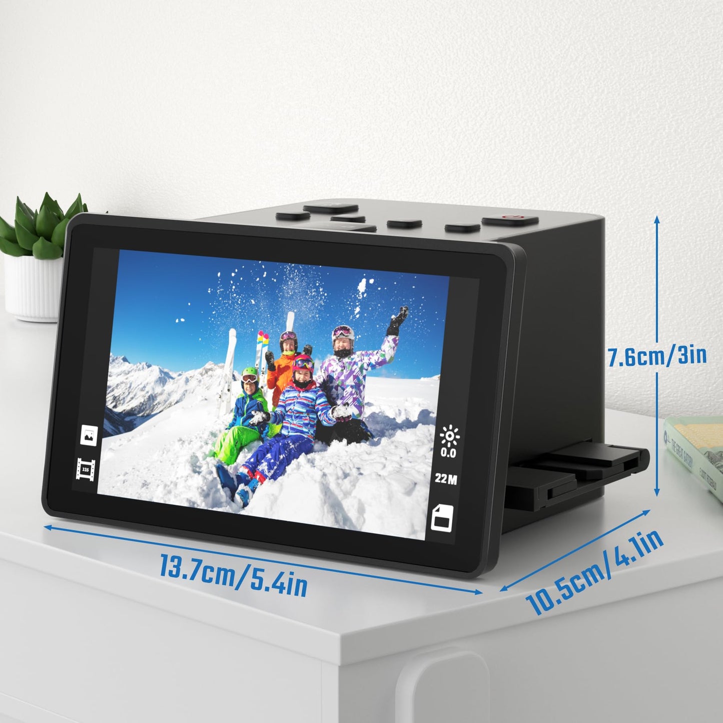 Digital film and slide scanner with large 5-inch LCD display, converts 135, 126 KPK, 110 negatives, color and black-and-white slides, and Super 8 film into 22 MP JPEG images.