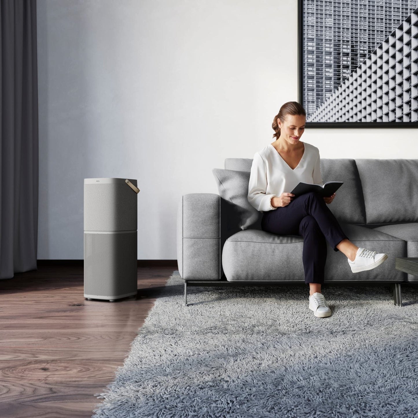 AEG AX91-604GY Air Purifier / eliminates 99.9% of airborne bacteria / only 17 dB(A) / Auto mode / air quality indicator / powerful filters / app control / up to 129 m² / light gray