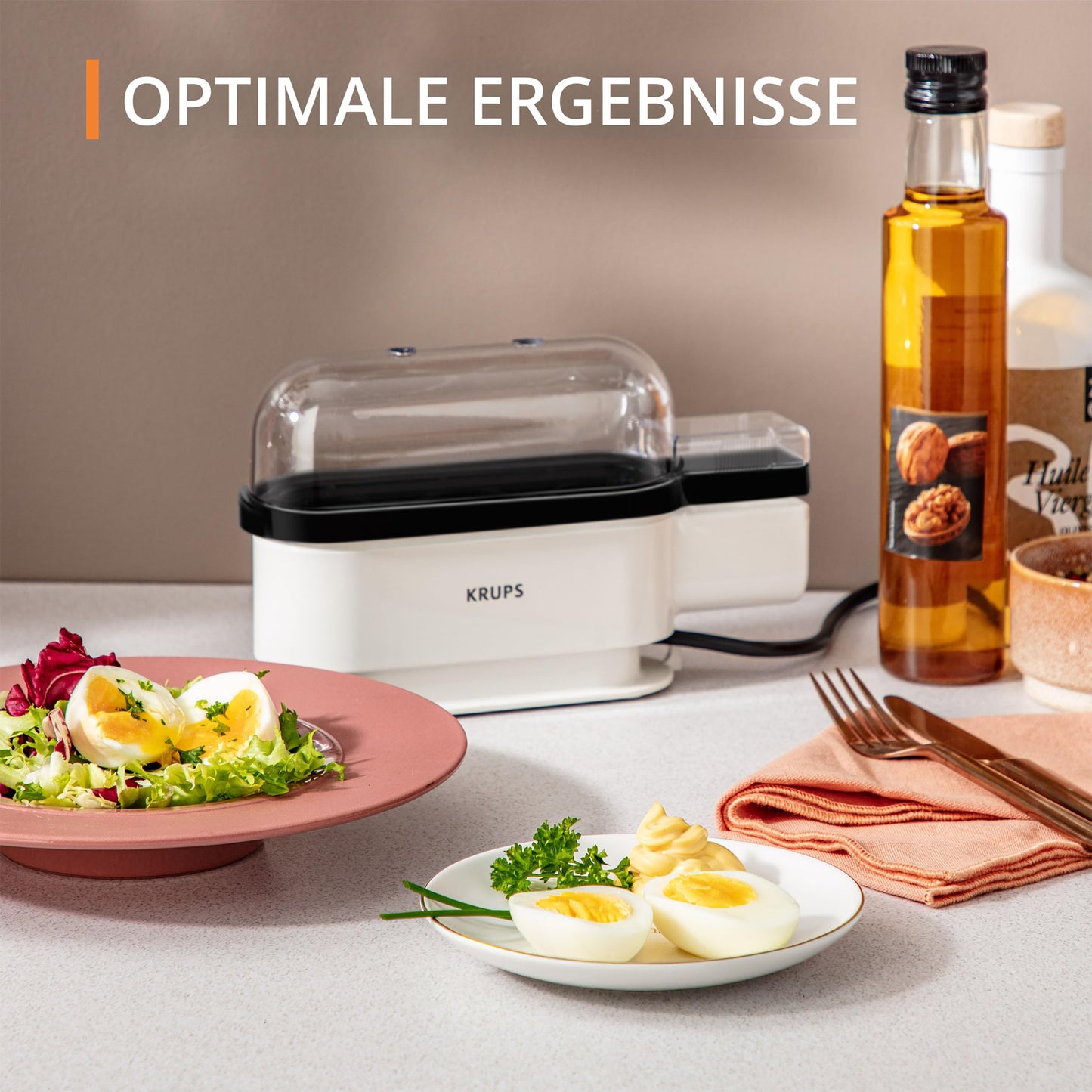 Krups Ovomat Trio egg cooker, For up to 3 eggs, Includes water measuring cup with egg piercer, egg holder, signal tone, EG234115, White/Black