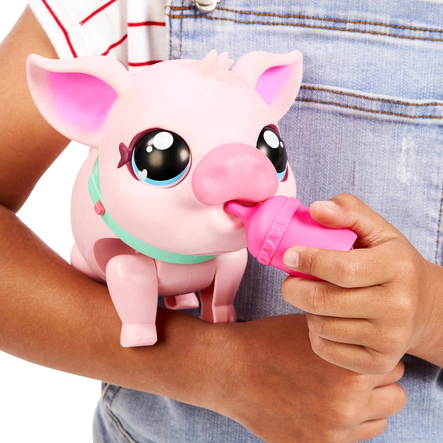 Little Live Pets - My Pet Pig, a cuddly interactive toy pig that walks, dances, and nuzzles. Featuring 20+ sounds and reactions. Batteries included. Ideal for kids ages 4 and up. Pink color.
