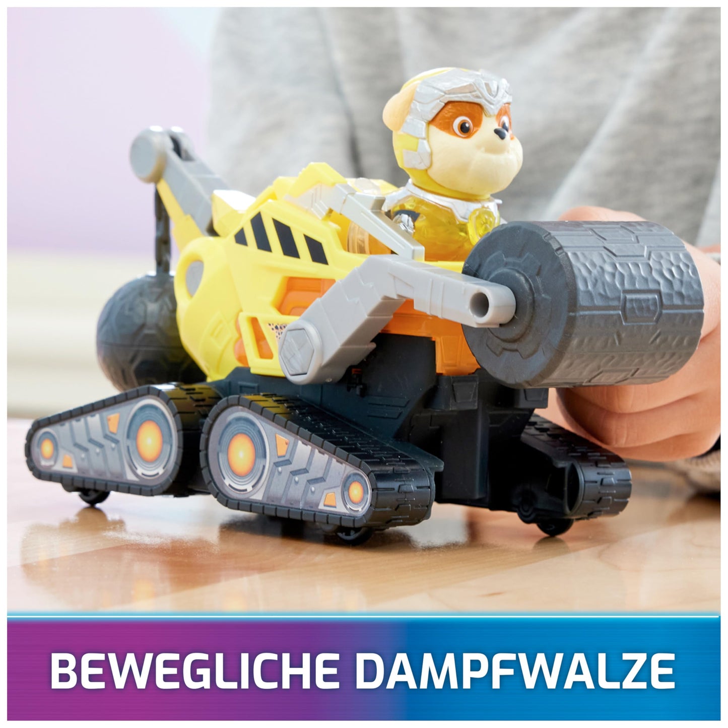 PAW Patrol: The Mighty Movie, superhero base vehicle by Rubble with puppy figure, construction vehicle with light and sound effects, toy suitable for children ages 3 and up.