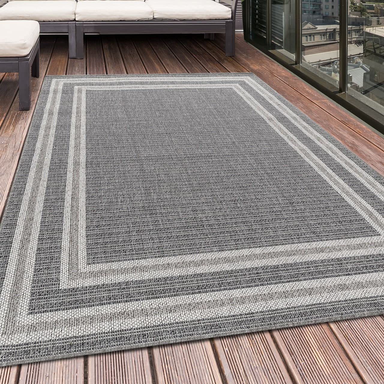 HomebyHome outdoor rug in grey, 60x100 cm. Ideal for kitchen, patio, balcony, garden, camping, living room, and bedroom. Border design, made of polypropylene with 7mm flatweave construction. Easy to care for.