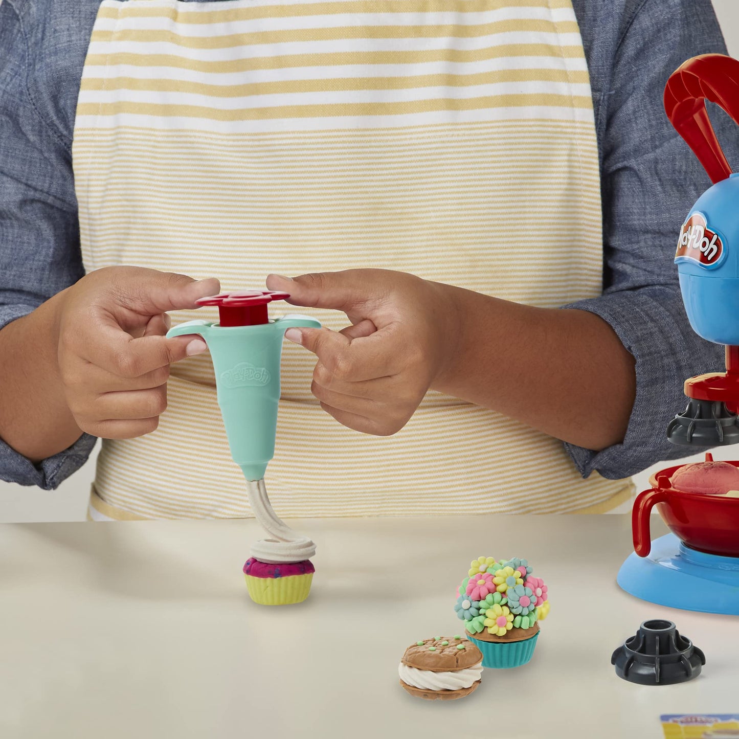 Play-Doh Kitchen Creations Kitchen Machine and Cookie Party Playset for kids aged 3 and up, comes with 15 cans.