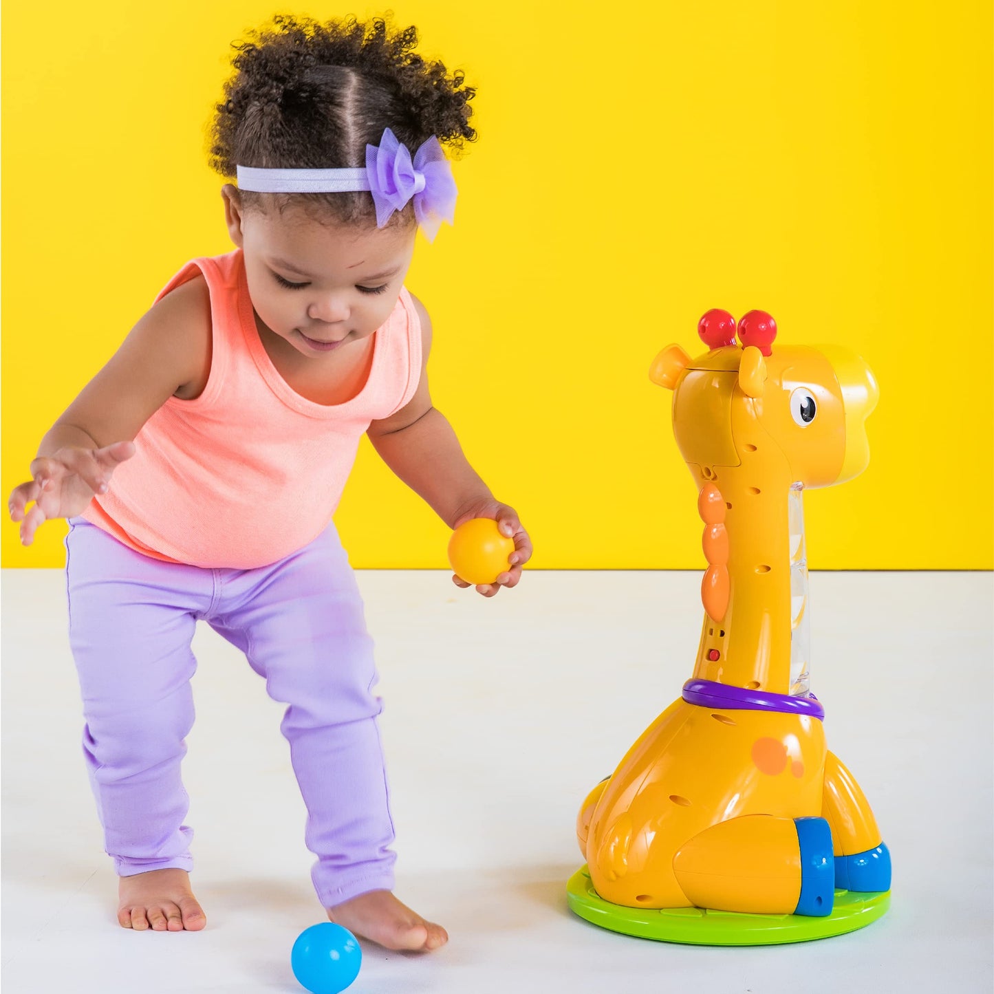 Bright Starts Spin & Giggle Giraffe Ball and Popper musical activity toy, age 12 months +