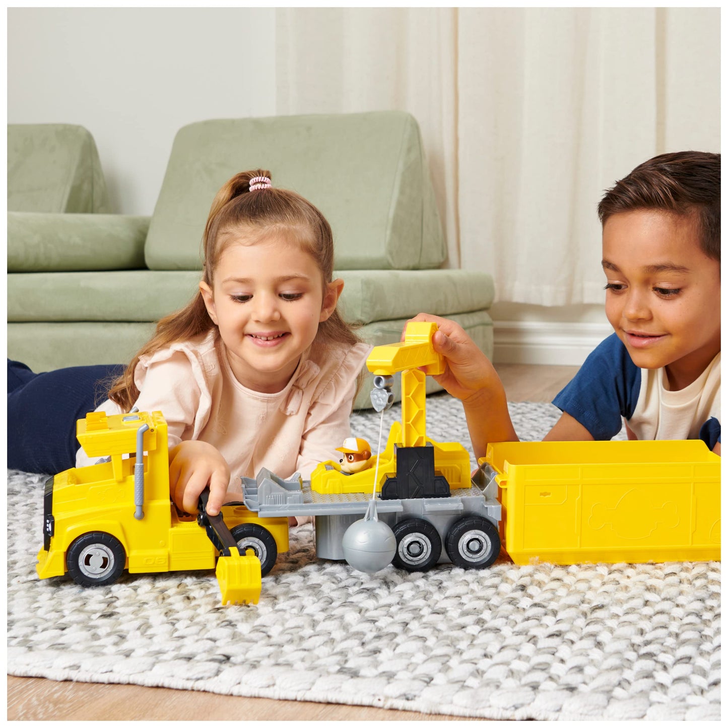 PAW PATROL 6064242 2-in-1 Rubble's Truck with digger, toy crane, lights and sounds, action figures, toy for kids ages 3 and up.