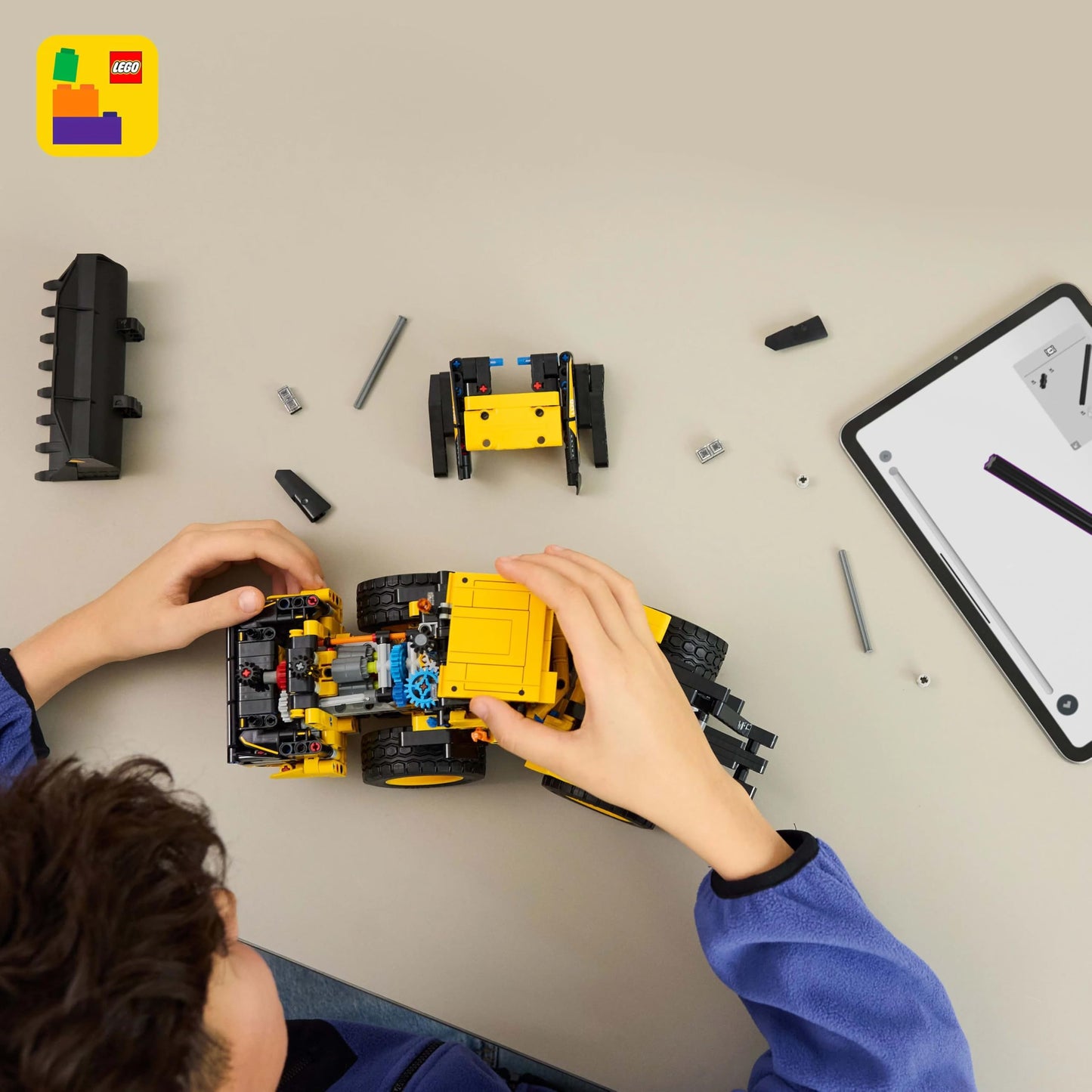 LEGO Technic Volvo L120 Electric Wheel Loader - Construction toy with articulated steering and movable bucket - Birthday gift for boys aged 9 and up - 42209