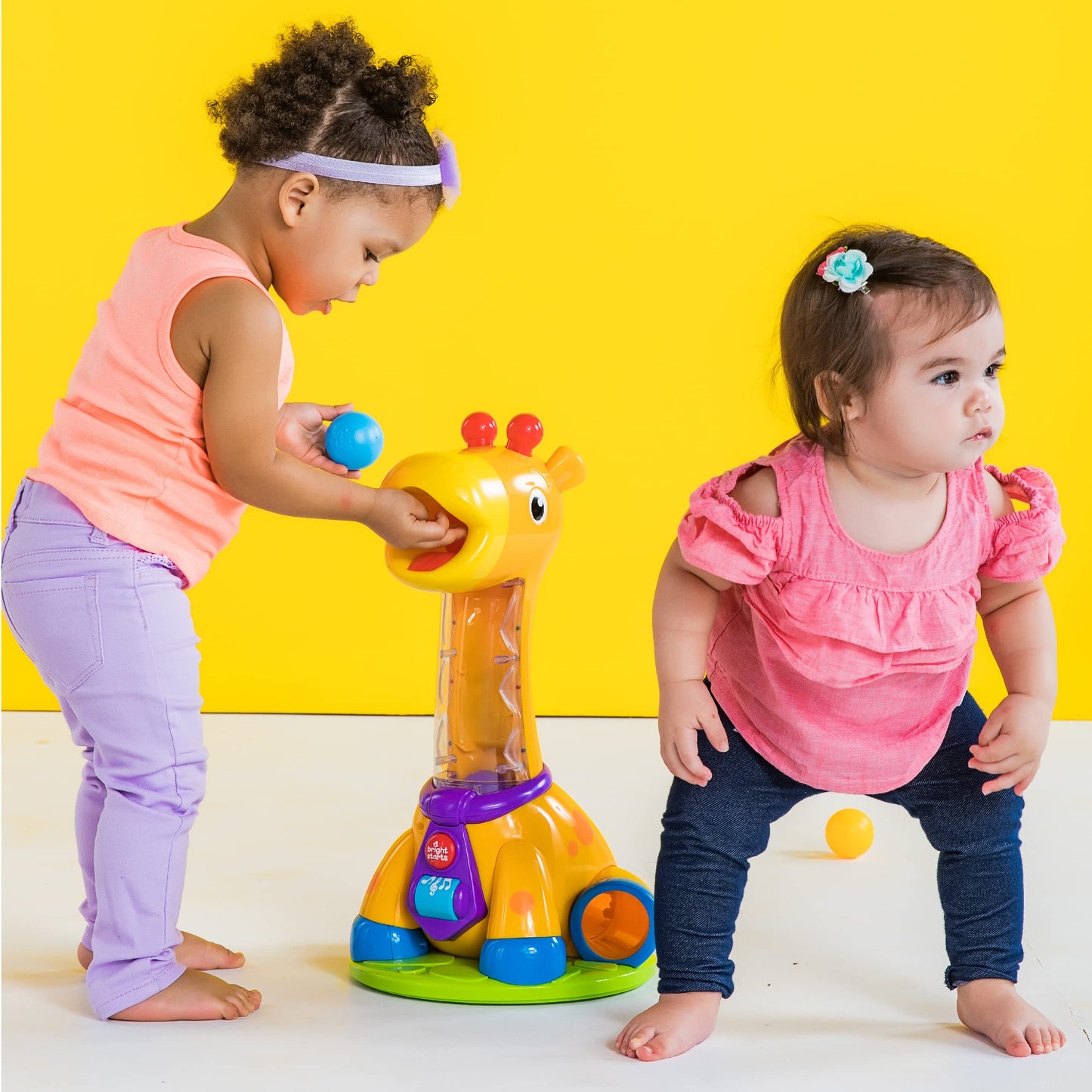Bright Starts Spin & Giggle Giraffe Ball and Popper musical activity toy, age 12 months +