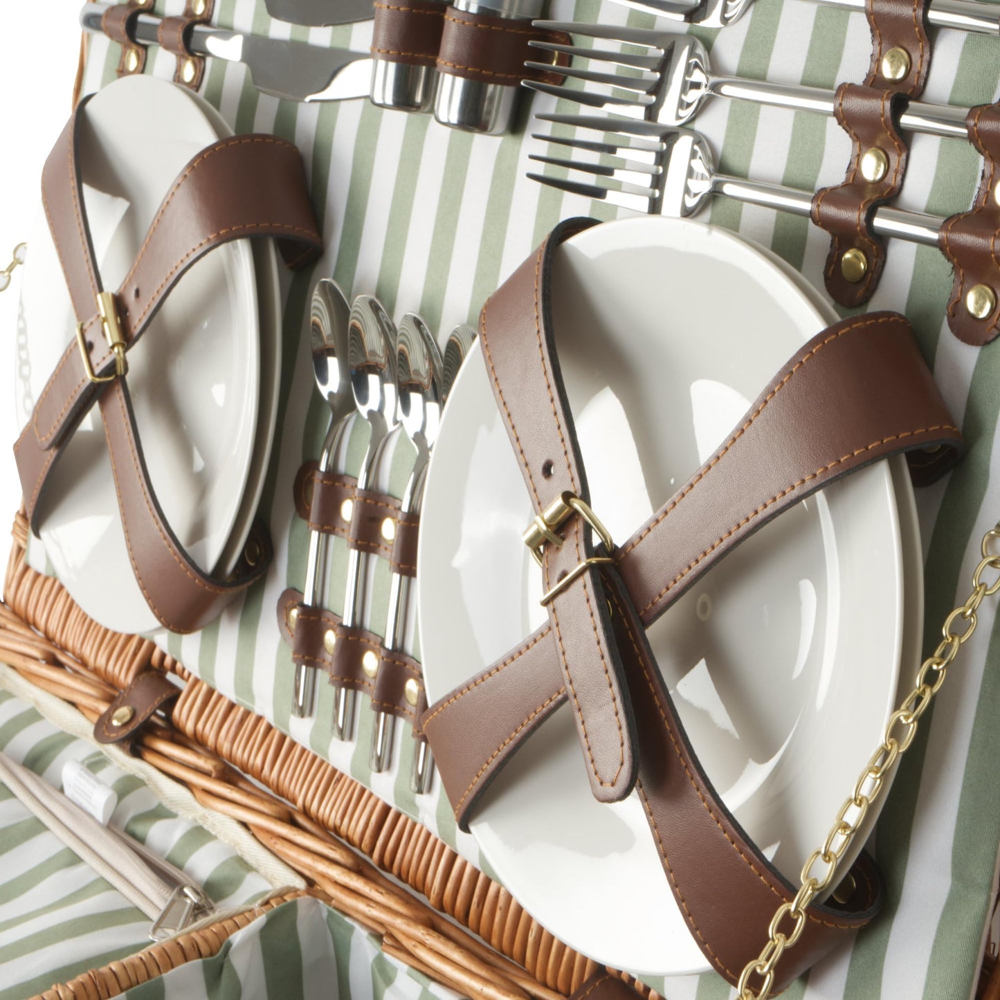 Campfire picnic basket for 4 people with 29-piece dish set and cooler compartment. Striped interior pattern, wicker basket with faux leather straps. Includes picnic bag and set.