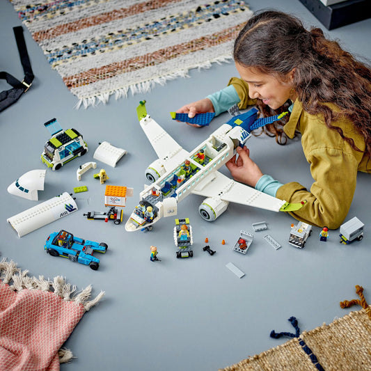 LEGO 60367 City Passenger Airplane Toy Set, large airplane model with airport ground vehicles: apron bus, pushback tug, catering loader, baggage cart, and 9 minifigures