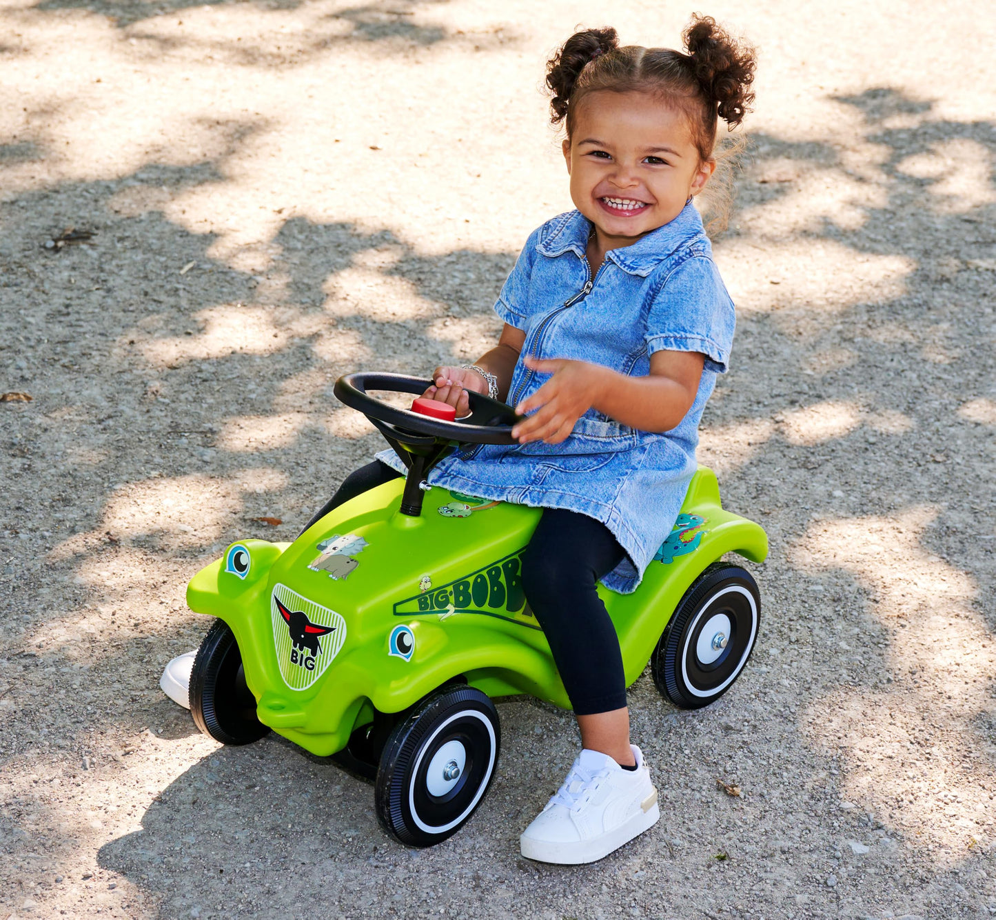 Big Bobby Car Classic Dino - Slide car for ages 1 and up in colorful dino design with black safety steering wheel and horn, for children from 12 months (up to 50 kg), green with stickers