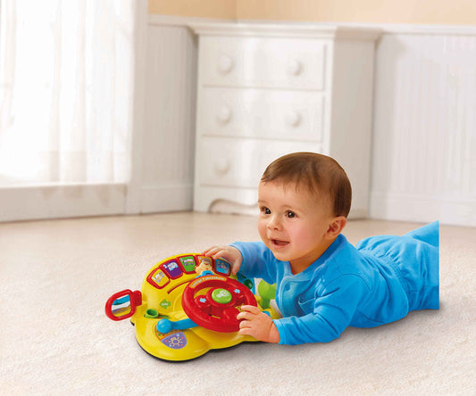 Vtech Baby Funny Driving School - children's toy with 3 game modes, colorful buttons, and music - for children aged 12-36 months.